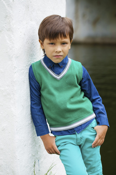 Fashionable little boy outdoor at the nice summer day - Foto, imagen