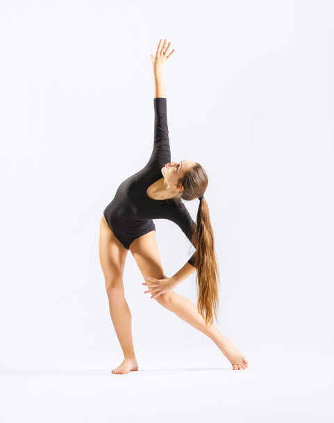 Young girl engaged art gymnastic - Foto, Imagen