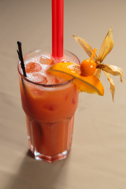 Exotic cocktail with juice and fruits. - 写真・画像
