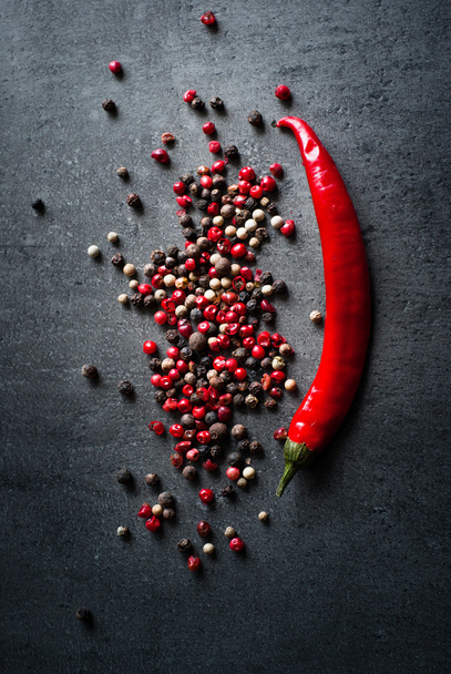 Peppercorns on a dark background - Фото, зображення