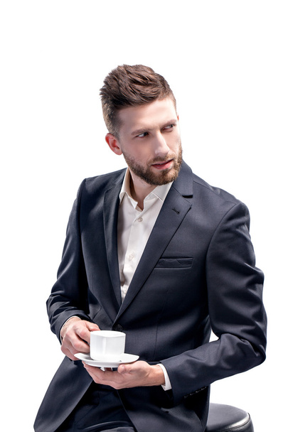 Portrait of handsome stylish man in elegant suit - Valokuva, kuva