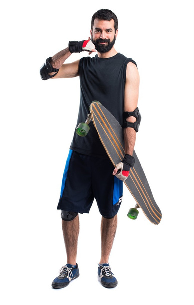Skater haciendo gesto de teléfono
 - Foto, imagen