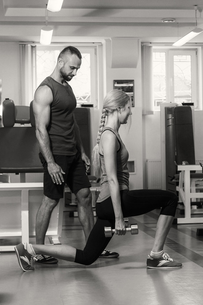 Sport couple on training in the gym. - Foto, afbeelding
