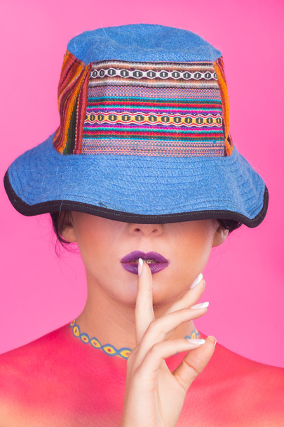 Creative beauty fashion photography. Bright make-up girl in a hat - Photo, Image