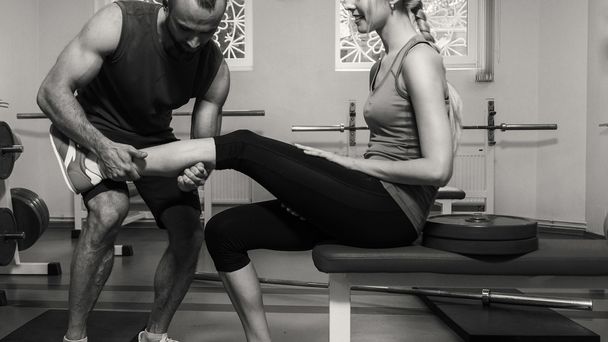 Sport couple on training in the gym. - Photo, Image