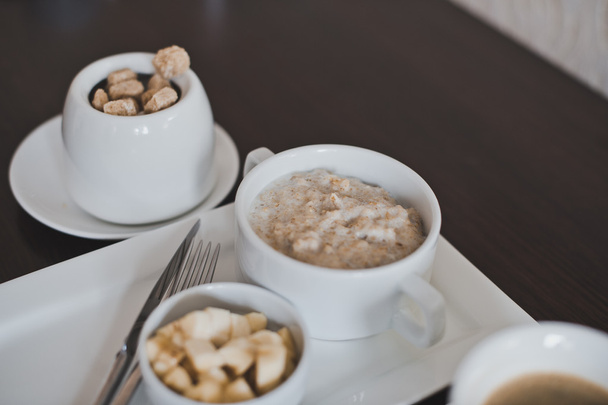 Dishes of porridge and coffee for Breakfast 5173. - Photo, Image