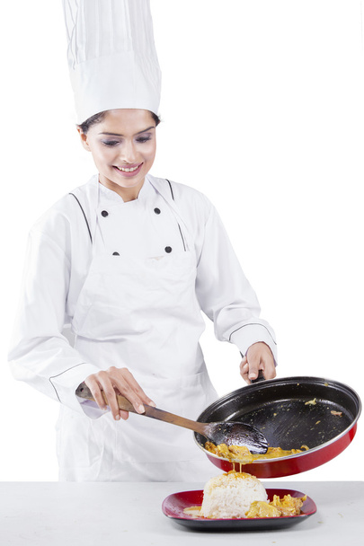 Female Chef Cooking Tasty Food - Foto, afbeelding