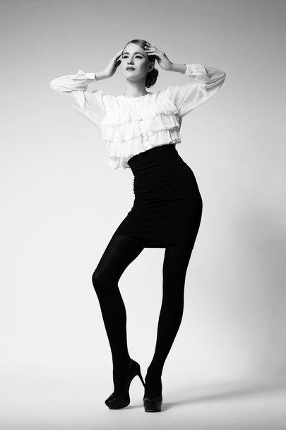 Retro girl in skirt and blouse - Fotó, kép