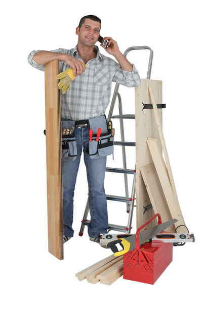 Handyman talking to a supplier - Foto, imagen