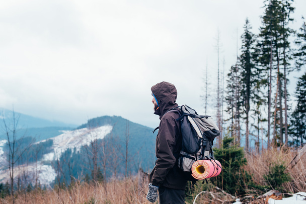 caucasian male hiking in mountains - Valokuva, kuva