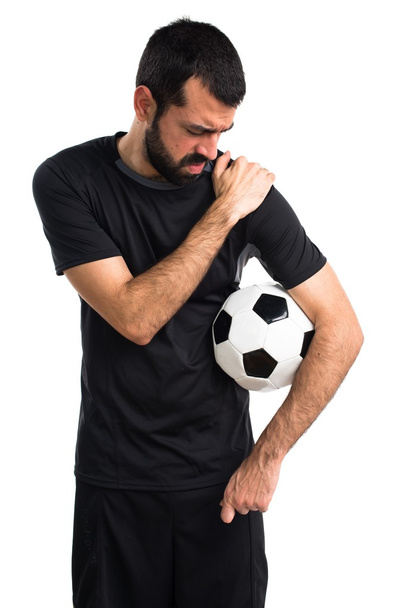 Футболіст з болем у плечі
 - Фото, зображення