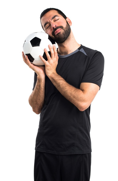 Jogador de futebol fazendo gesto de sono
 - Foto, Imagem