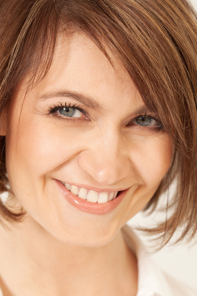 Adult smiling brunette in close-up. - Fotografie, Obrázek