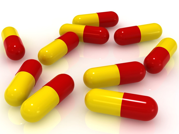 Red yellow pills. - Photo, Image