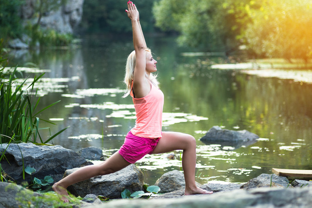 Young woman doing yoga - Foto, immagini