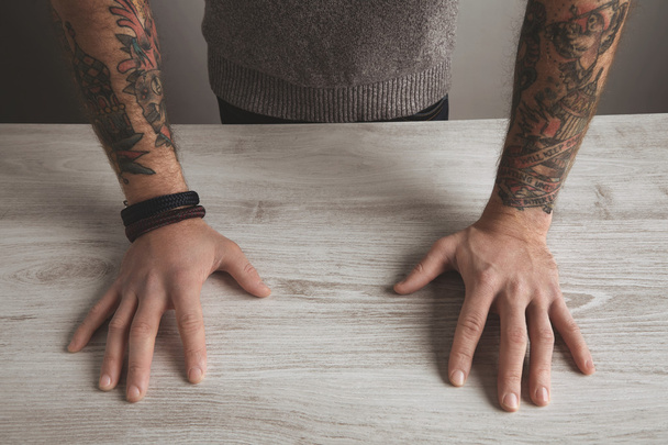 close unrecognizable brutal man tattooed hands isolated - Fotó, kép
