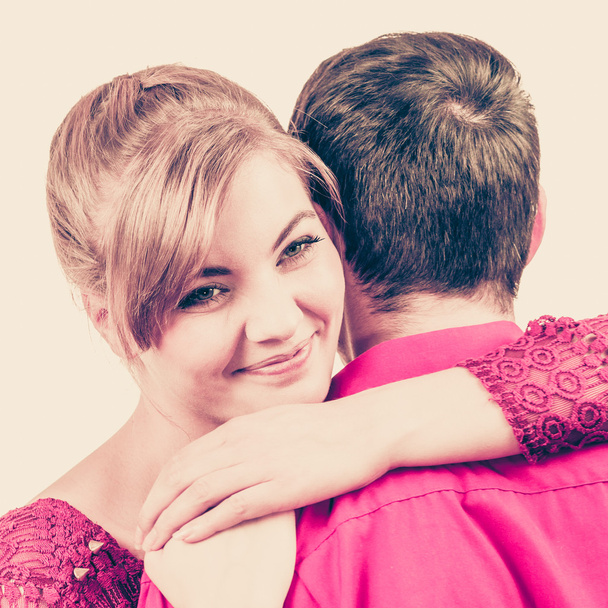 Girl hugging boyfriend romantically. - Фото, изображение