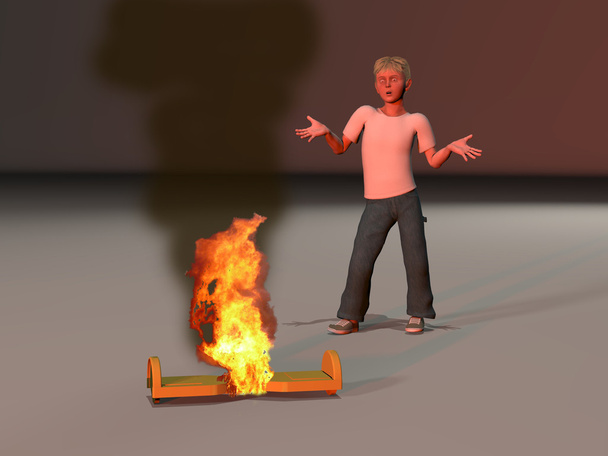 boy mesmerized by his burning hoverboard - Photo, Image
