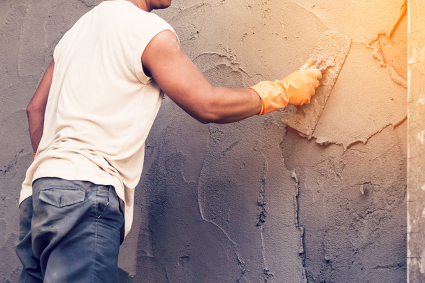 muž Štukatér betonu na zdi domů stavební buil - Fotografie, Obrázek