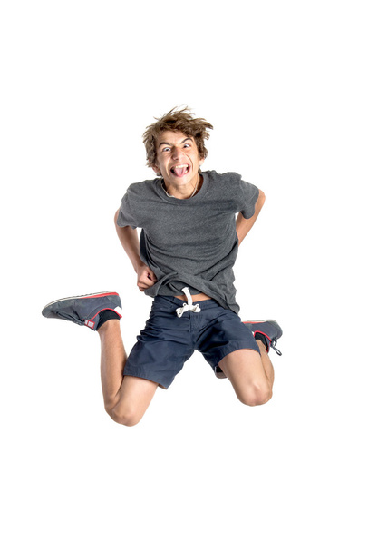Jumping teen boy - Fotó, kép