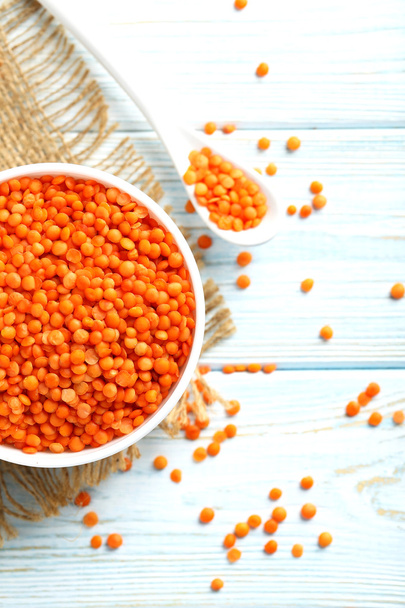 Red lentils in bowl - Φωτογραφία, εικόνα