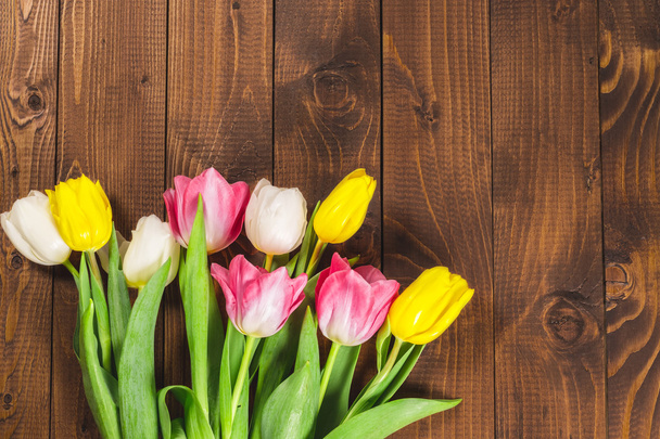 Bouquet Of Tulips On Wooden surface - Fotografie, Obrázek