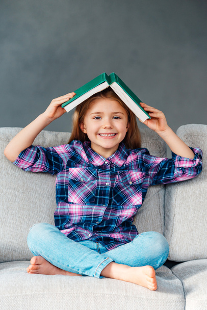 little girl holding book - Fotó, kép