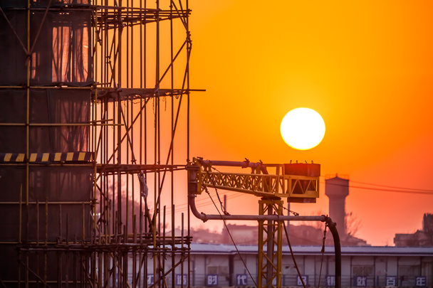 Scaffolding silhouette at sunset - Photo, Image