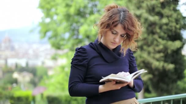 woman reading book  - Кадры, видео
