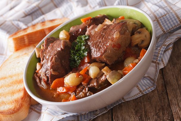 French cuisine: beef Bourguignon close up in a bowl. horizontal - Photo, Image