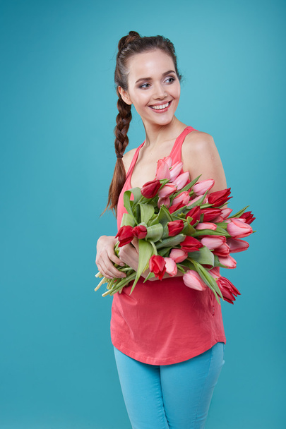 woman with tulips flowers - Foto, Imagem