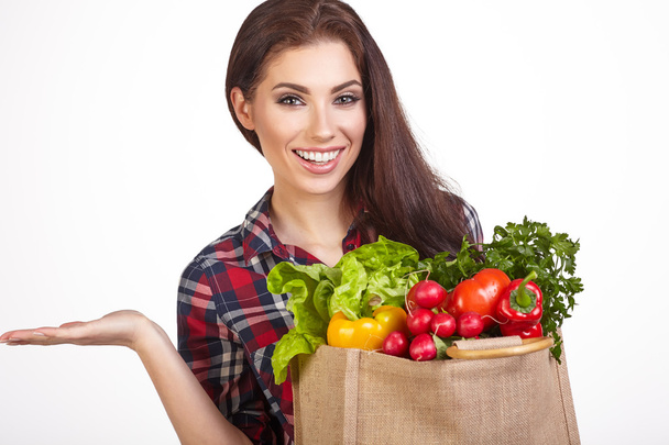 woman with grocery bag and vegetables - Foto, Imagem