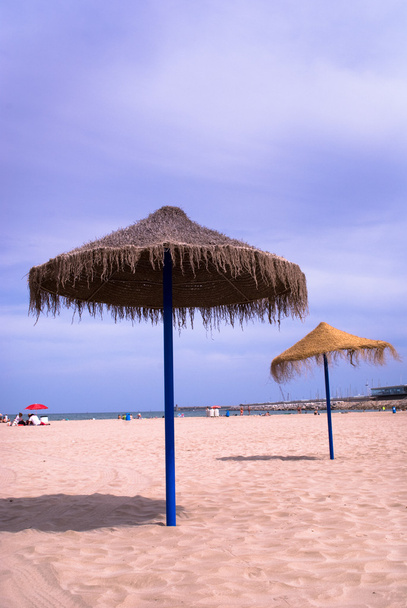 Sombreros na praia
 - Foto, Imagem