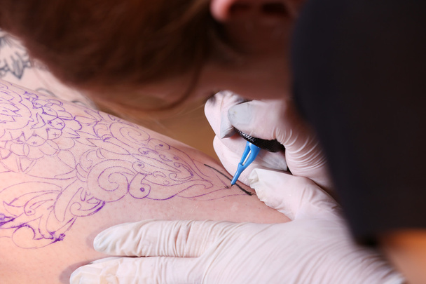 Process of making tattoo  - Fotó, kép