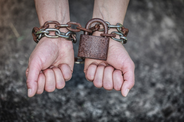 Closeup woman with chained hands and padlock - Φωτογραφία, εικόνα