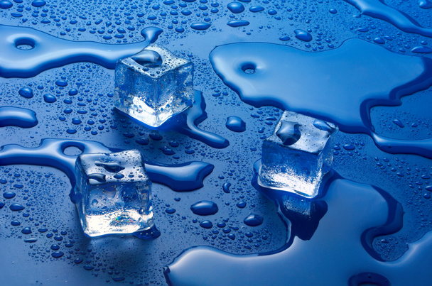 Cold. Frozen ice cubes on the table, Stock Photo, Picture And Low Budget  Royalty Free Image. Pic. ESY-024634008