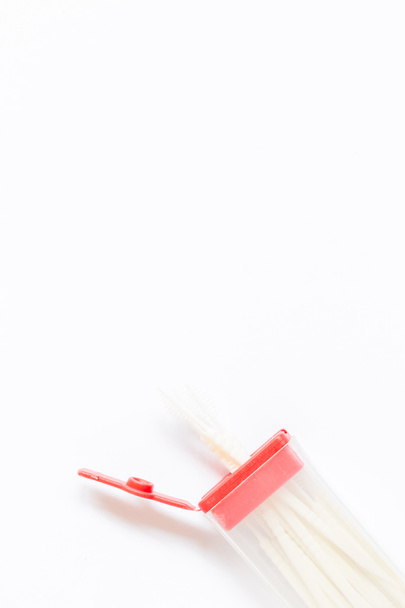 Mondelinge apparaat: Tandenstoker op wit papier achtergrond - Foto, afbeelding
