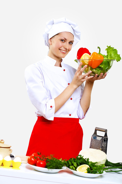 Portrait of a young cook in uniform - Foto, afbeelding
