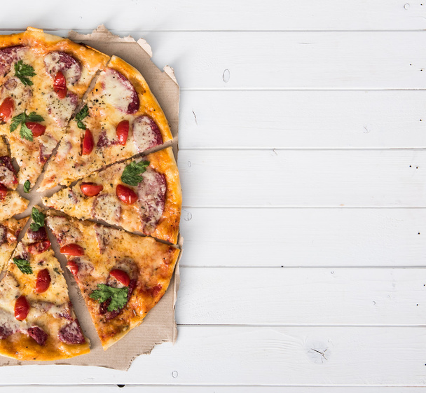 delicious portioned pizza and text space - Foto, Bild