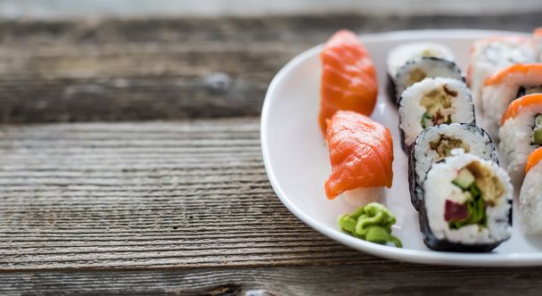 various sushi on white plate - Valokuva, kuva