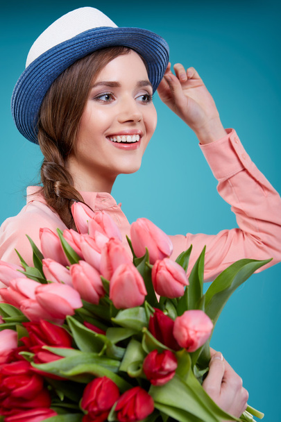 woman with tulips flowers - Photo, Image
