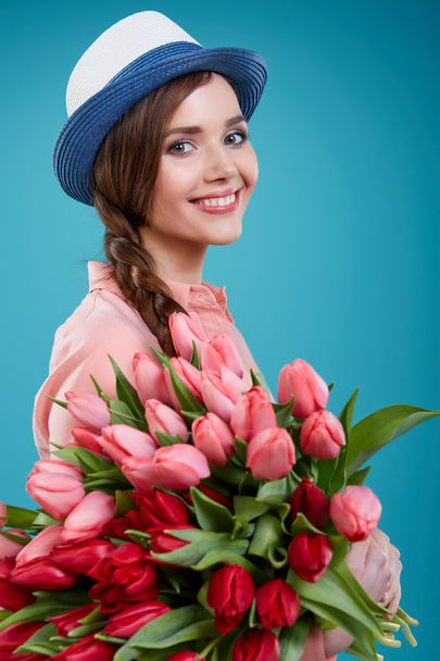 woman with tulips flowers - Foto, Bild