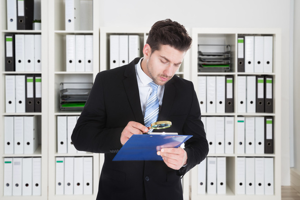 Businessman Looking At Document  - Photo, image