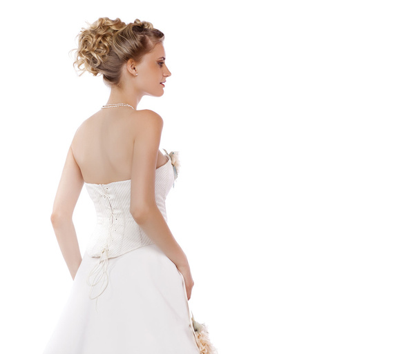 Young beautiful blond woman with a wedding hairstyle - Foto, Bild