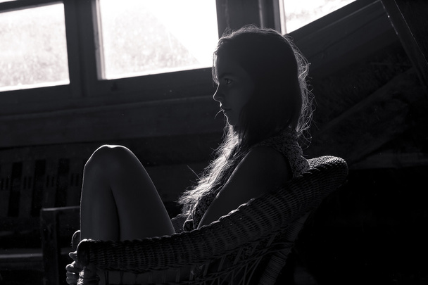 bw shot of a profile silhouette of a teenage girl - 写真・画像
