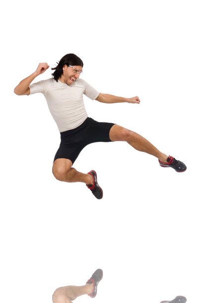 Young man doing sports isolated on the white - Photo, Image