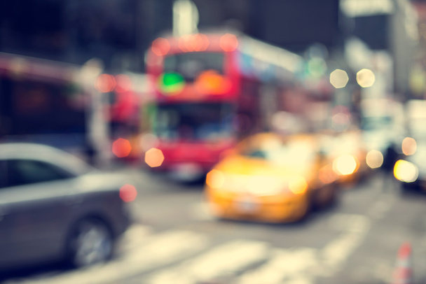Blurry abstract photo of yellow taxi cabs in Times Square in Manhattan - Fotoğraf, Görsel