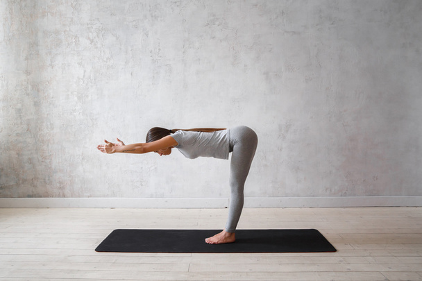 Woman practicing advanced yoga - Photo, Image
