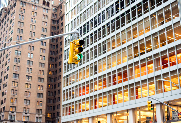 New York city traffic lights with skyscrapers on background - Фото, зображення