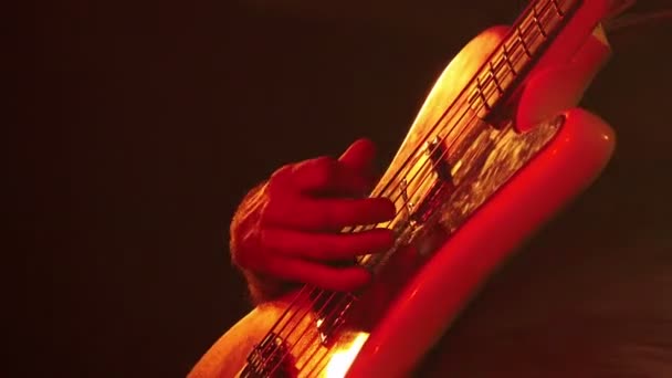 guitarist playing rock music in a concert - Felvétel, videó